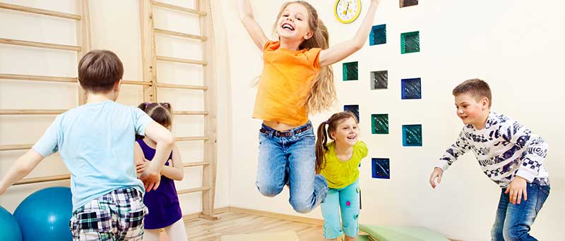 Children playing in a room together