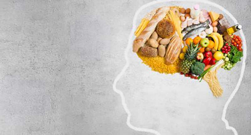 Outline of head with a pile of vegetables in the space where the brain should be